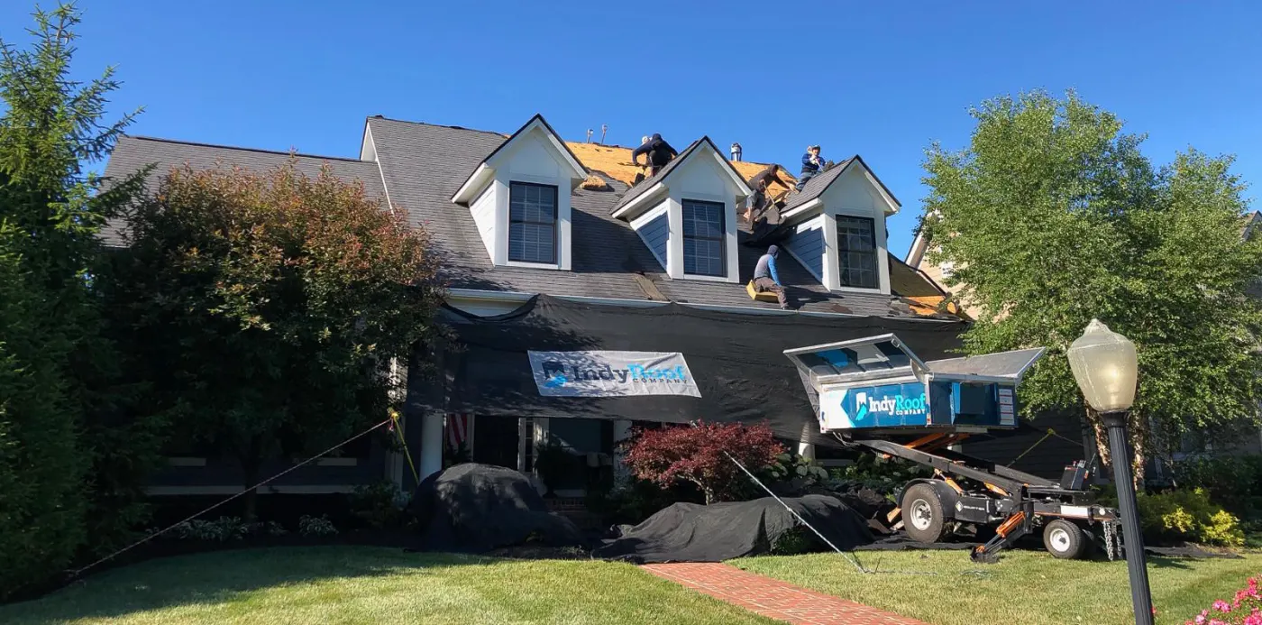 Tarping and dry-in on a Greens Fork commercial roof
